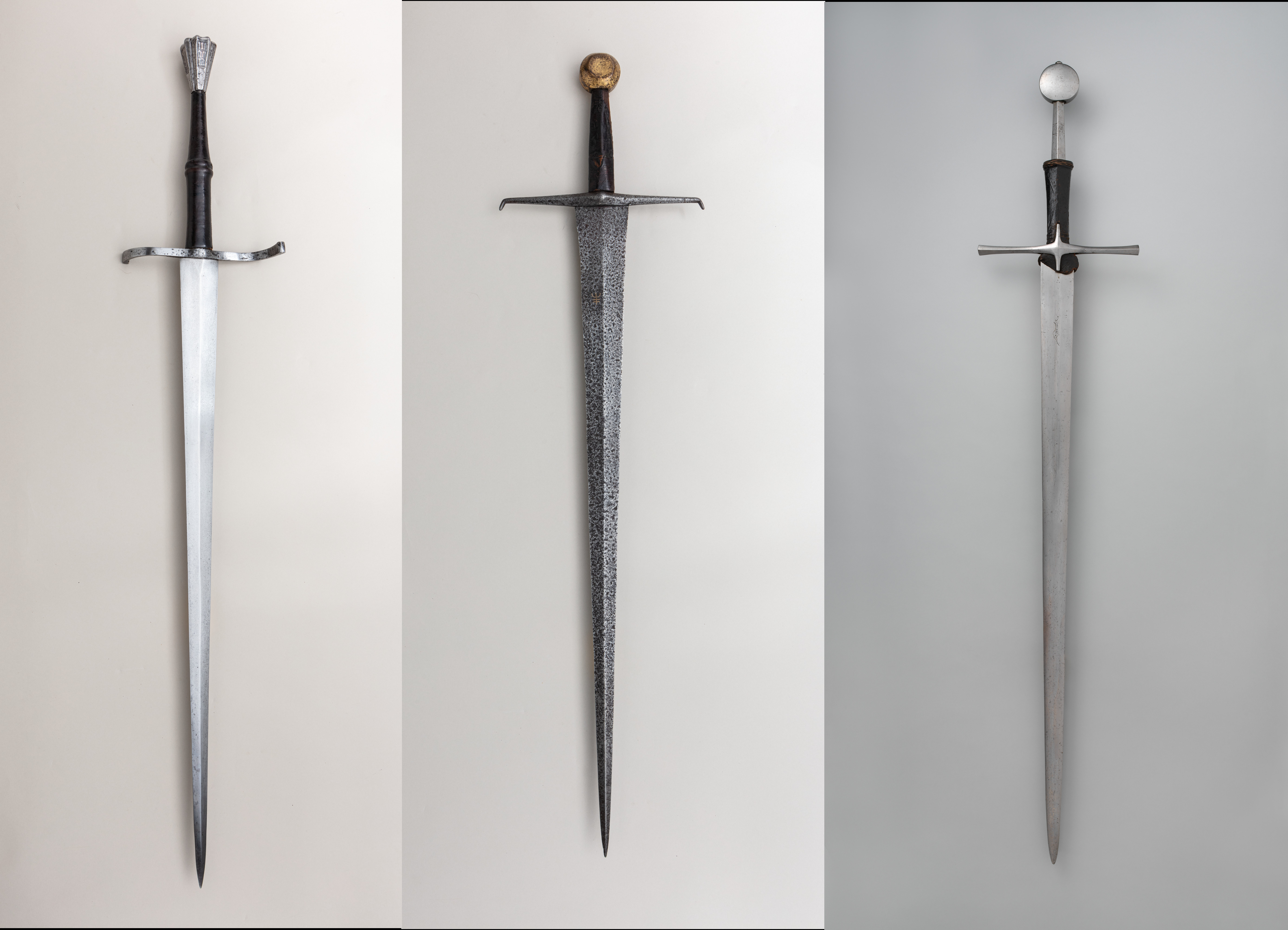 Photos of three historical longswords of different types